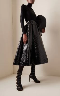 ALAIA Buckled Leather Sandals