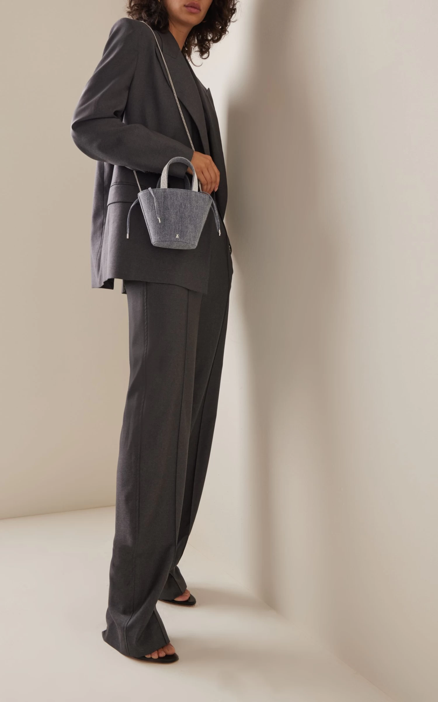 Amina Muaddi Rih Crystal-Embellished Denim Bucket Bag 3 Amina Muaddi Rih Crystal-Embellished Denim Bucket Bag