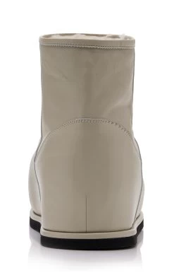 Amina Muaddi Heidi Shearling-Lined Leather Boots -Lady Fashion Store amina muaddi ivory heidi boot 35 25 2