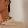 Jacquemus Les Boucles J Gold-Tone Earring 1 Jacquemus Les Boucles J Gold-Tone Earring -Lady Fashion Store jacquemus gold les boucles j ouro