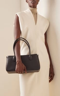 The Row E/W Leather Top Handle Bag 10 The Row E/W Leather Top Handle Bag -Lady Fashion Store the row black e w top handle 2