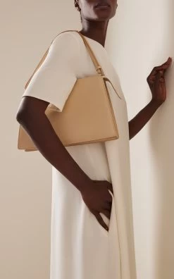 The Row Delanie Leather Bag -Lady Fashion Store the row neutral delanie leather bag 2