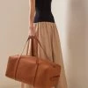 The Row Gio Leather Duffle Bag -Lady Fashion Store the row neutral gio