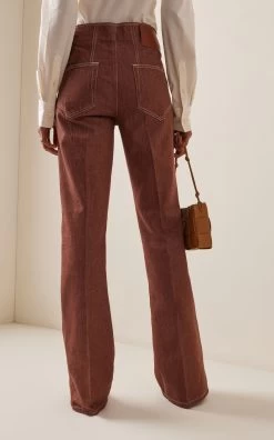 Victoria Beckham Cuffed Raw Hem Flare Jeans 8 Victoria Beckham Cuffed Raw Hem Flare Jeans -Lady Fashion Store victoria beckham brown cuffed raw hem flare jeans 2